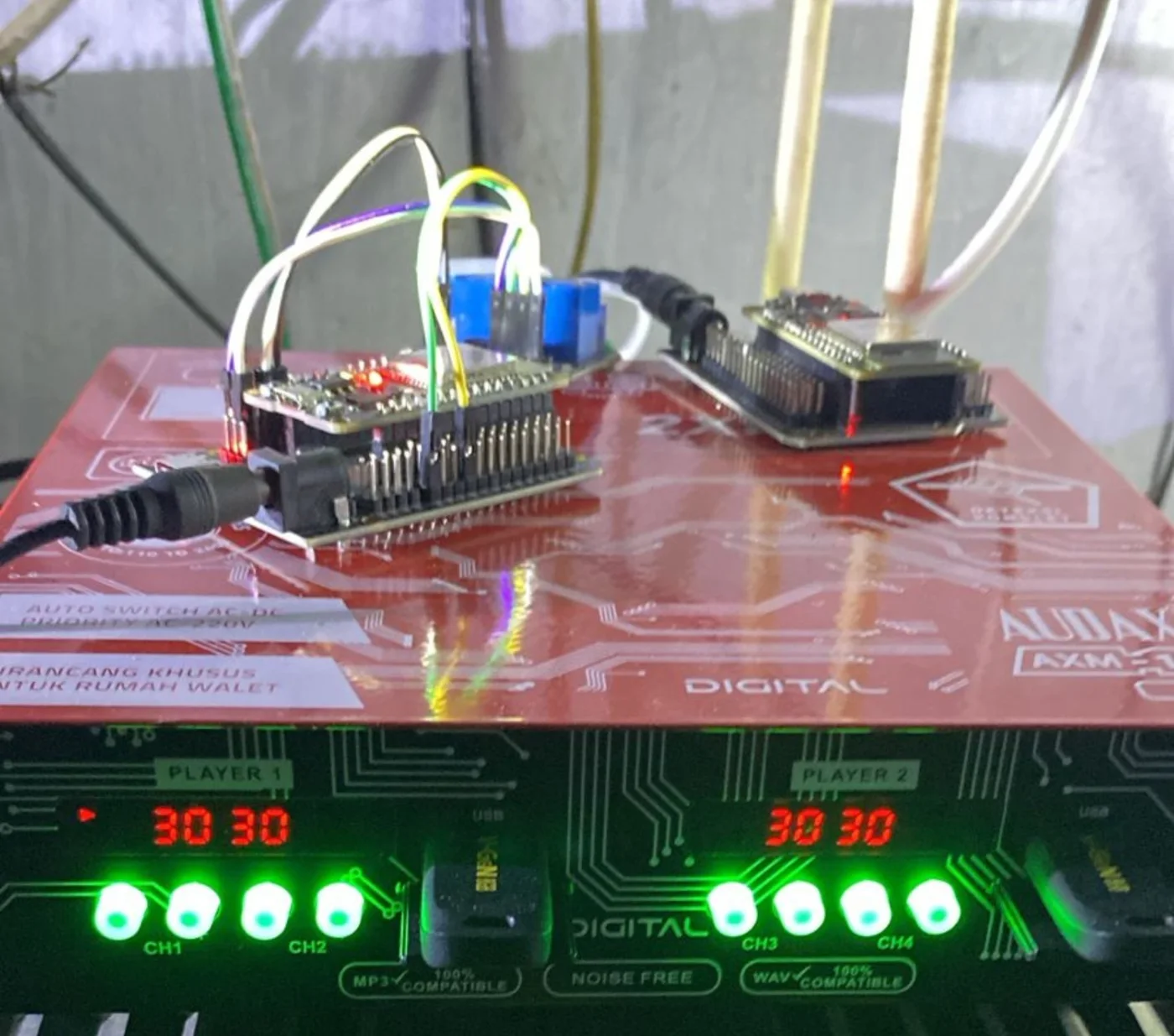 ESP32 development boards connected to the audio control system